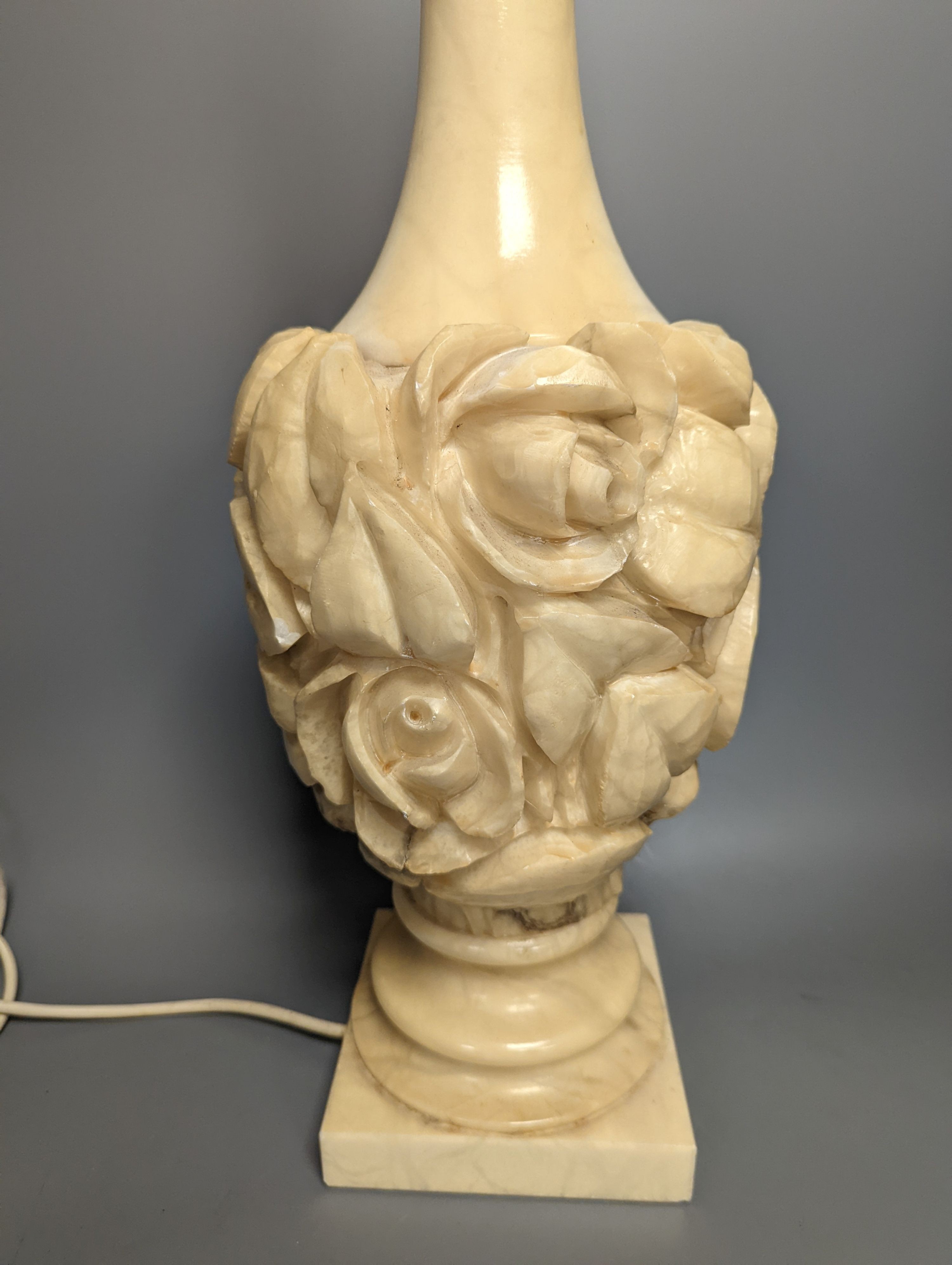 A carved alabaster lamp, height 60cm excl. light fitting, and a turned alabaster plafonnier, 35.5 cm diameter